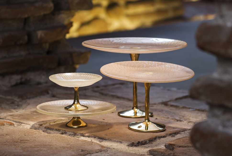 Renaissance Patterns tabletop stands Combination of stands on bronze pedestals in Filigree pattern and complimentary soft colours with beautiful antient ruins on the background
