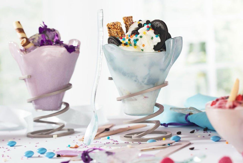 ice cream bowl light dawn blue ice cream bowl, gently supported by a metal spiral base with glass spoons in blue and pink