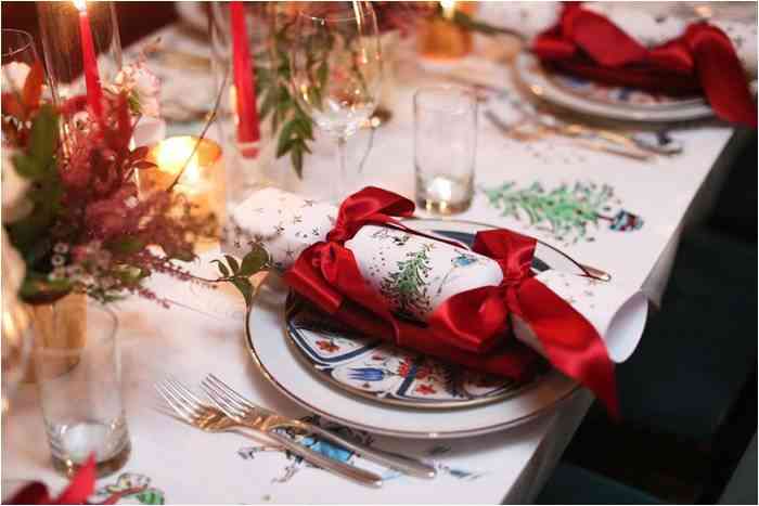 Ribbon Tied Napkins in Christmas table setting