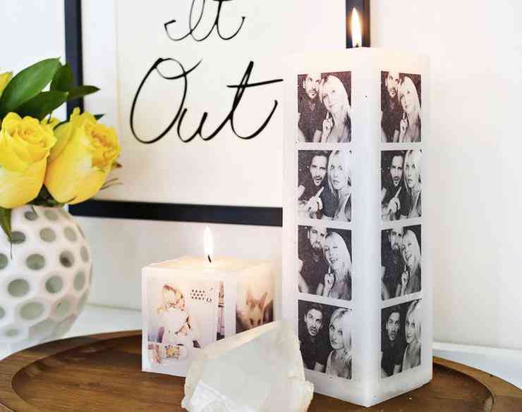 Beautifull candle made to be also a frame in white with black and white pictures on it