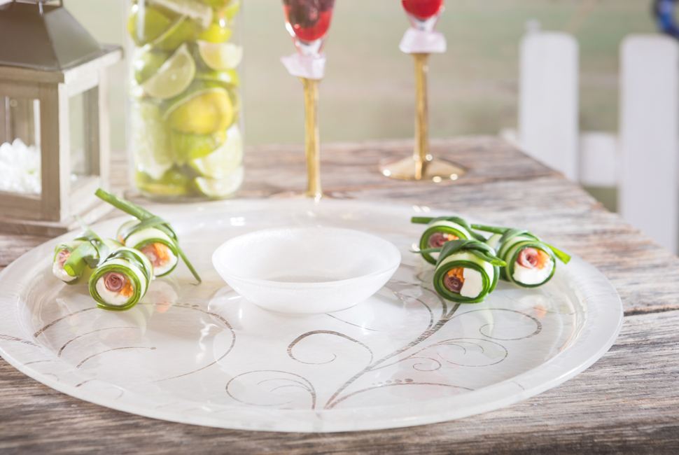 Heme is round serving dip platter teamed with a small bowl, both in gentle cream with our lively Vivace pattern.