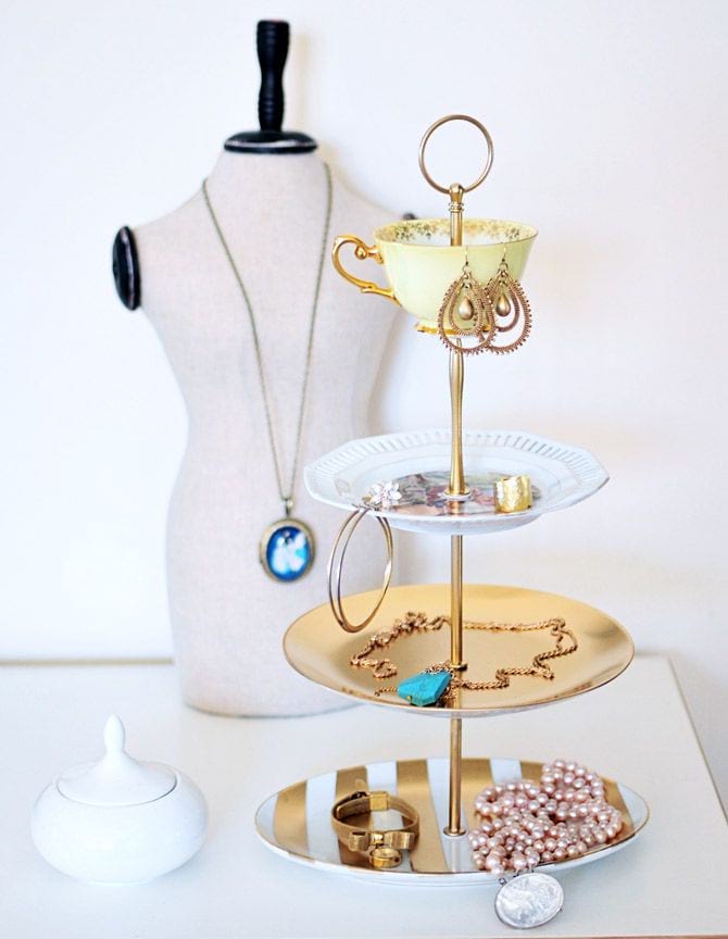 3 tier cake stand covered in various jewellery
