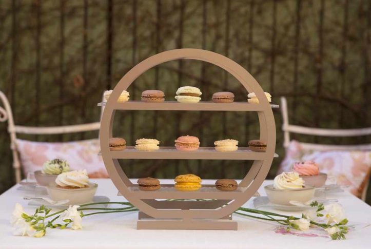 3 tier cake stand covered in macaroons