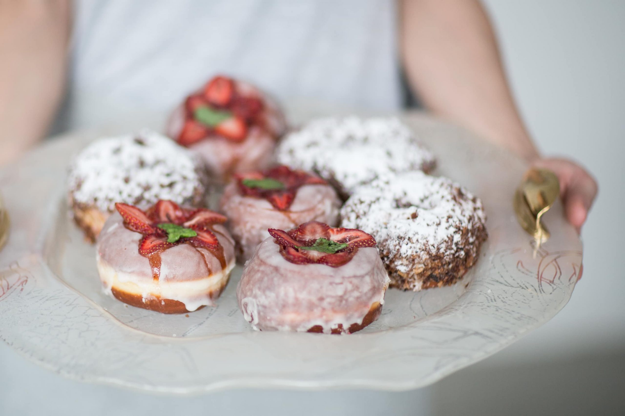 donut display - donut day - Sali - strawberry donuts on glass tray with handles