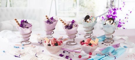 Colourful ice cream bowls filled with ice cream